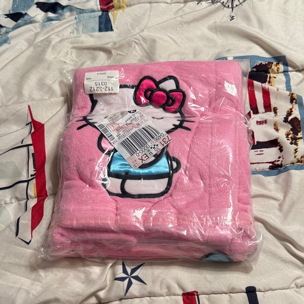 Hello Kitty Pink and White Blanket with Bow Design